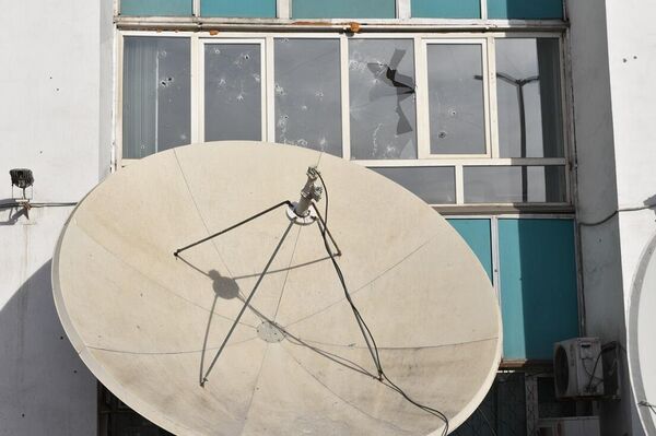 Республика алаңындағы №13-ші ғимаратқа атылған оқтың іздері - Sputnik Қазақстан