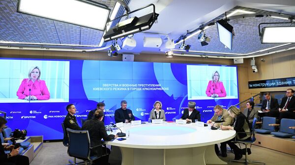 Презентация доклада о военных преступлениях киевского режима в Красноармейске - Sputnik Казахстан