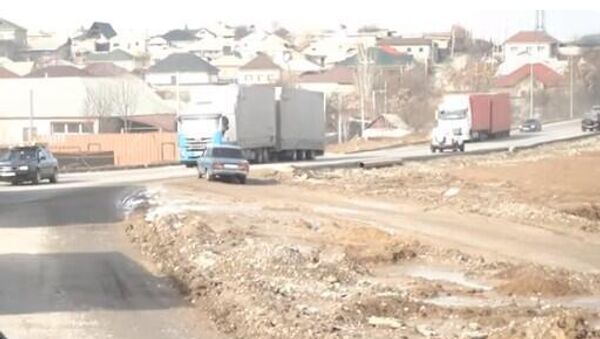 Шымкентте жауын салдарынан жаңа салынған жол шөгіп кетті - Sputnik Қазақстан