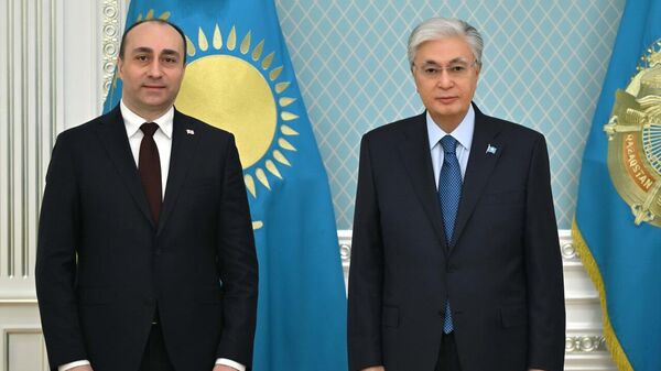 Министр внутренних дел Грузии Гела Геладзе и Касым-Жомарт Токаев - Sputnik Казахстан