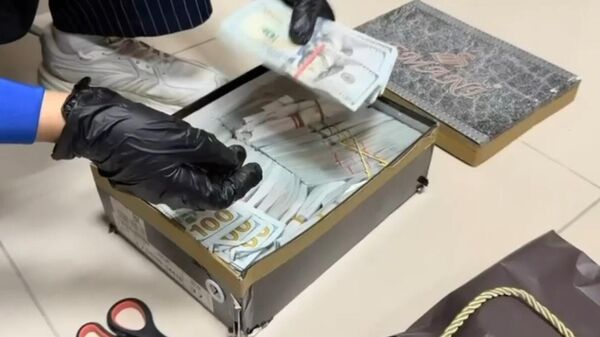 АФМ проводит обыск у подозреваемого в незаконных кредитных схемах - Sputnik Қазақстан