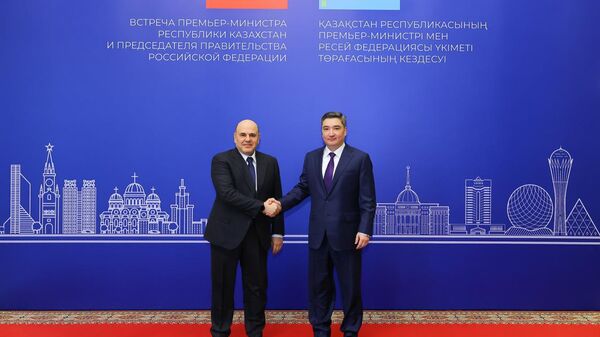 Главы правительств России и Казахстана Михаил Мишустин и Олжас Бектенов - Sputnik Казахстан