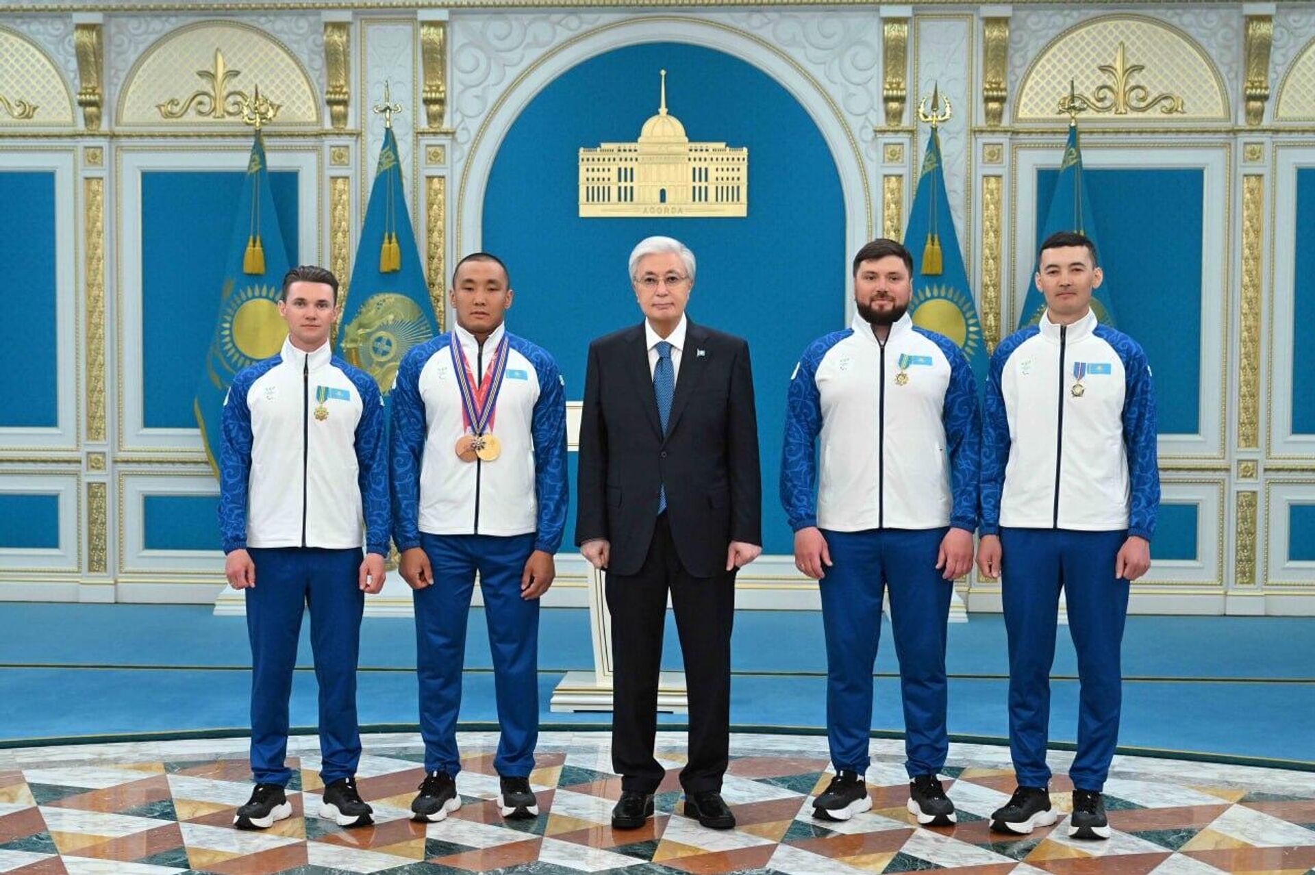 Касым-Жомарт Токаев наградил паралимпийца Ербола Хамитова  и его тренеров - Sputnik Қазақстан, 1920, 26.03.2026