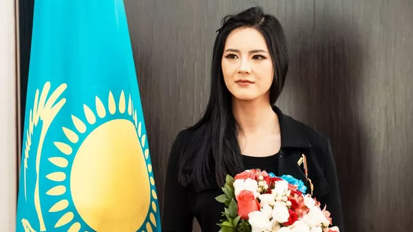 Китайский блогер-миллионник, амбассадор Kazakh Tourism Тао Минсю награждена орденом Достық II степени  - Sputnik Қазақстан