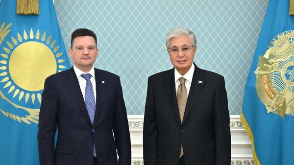  Касым-Жомарт Токаев принял председателя правления Евразийского банка развития Николая Подгузова  - Sputnik Казахстан