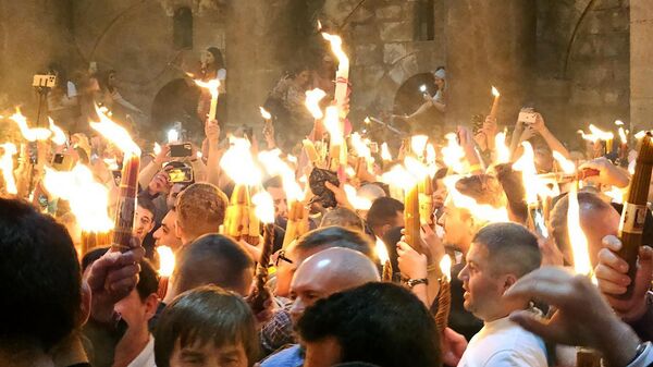 В храме Гроба Господня в Иерусалиме сошел Благодатный огонь, архивное фото - Sputnik Казахстан