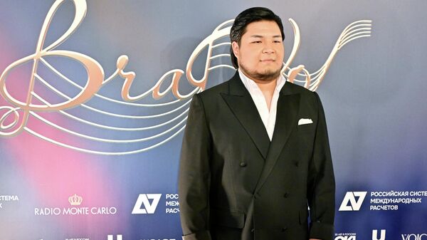 Казахский оперный певец Алихан Бейсеков  - Sputnik Казахстан