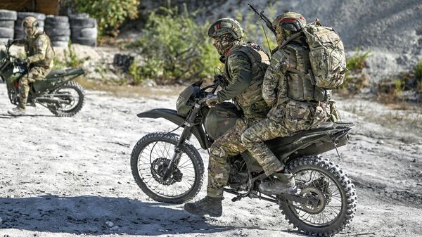 Боевое слаживание штурмовых подразделений группировки войск Центр в зоне СВО - Sputnik Казахстан