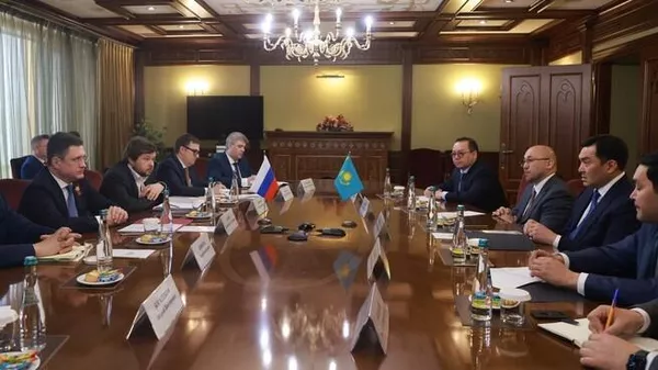 Александр Новак встретился с Министром энергетики Казахстана Ерланом Аккенженовым - Sputnik Казахстан