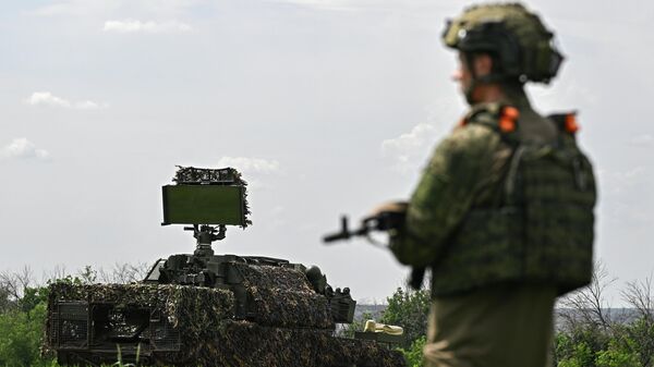 Боевое дежурство расчета Тор-М2 группировки войск Запад на Купянском участке СВО - Sputnik Казахстан