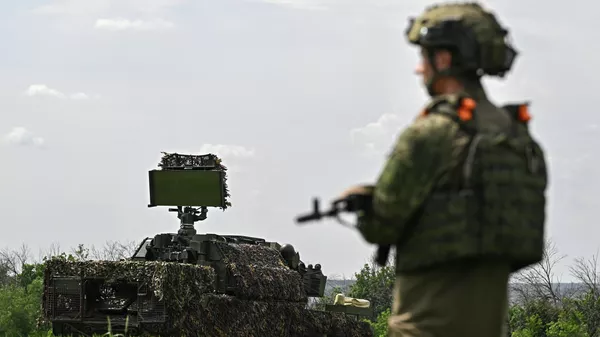 Боевое дежурство расчета Тор-М2 группировки войск Запад на Купянском участке СВО - Sputnik Казахстан