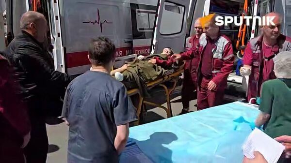 Детей, пострадавших от удара БПЛА ВСУ под Брянском,  привезли в Минск  - Sputnik Казахстан