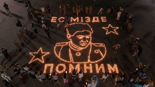 Акция Огненные картины войны прошла в Алматы в парке имени 28 панфиловцев - Sputnik Қазақстан