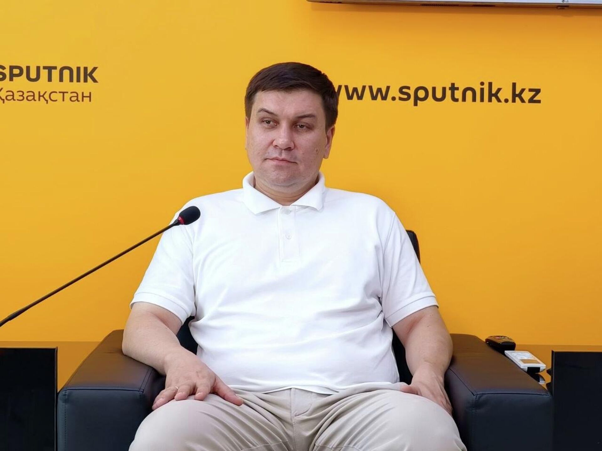 Директор центра аналитических исследований Евразийский мониторинг Алибек Тажибаев  - Sputnik Казахстан, 1920, 21.07.2026