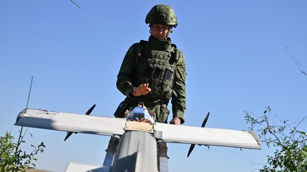 Боевая работа расчета БПЛА Молния-ПВО в зоне СВО - Sputnik Казахстан