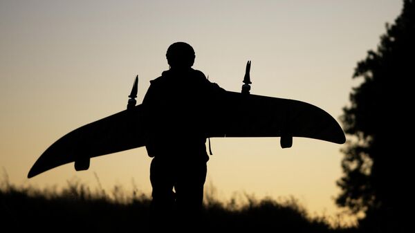 Боевая работа расчета БПЛА КВО спецназа Ахмат группировки войск Север на Сумском направлении СВО - Sputnik Казахстан