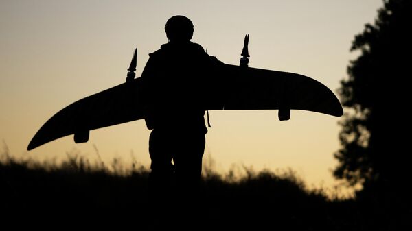 Боевая работа расчета БПЛА КВО спецназа Ахмат группировки войск Север на Сумском направлении СВО - Sputnik Казахстан