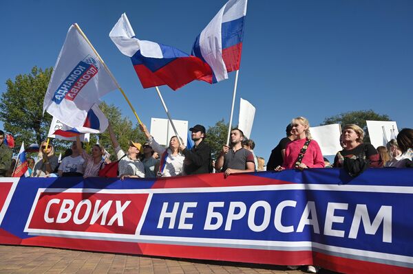 Празднование присоединения к России ЛНР, ДНР, Херсонской и Запорожской областей в регионах РФ Празднование присоединения к России ЛНР, ДНР, Херсонской и Запорожской областей в регионах РФ - Sputnik Казахстан