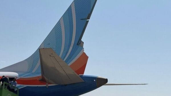 Поврежденный самолет FlyDubai - Sputnik Казахстан