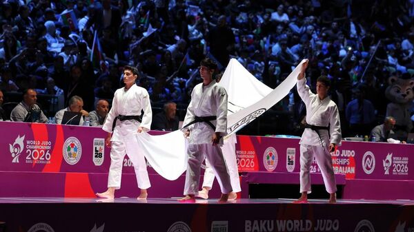 Казахстану передали флаг чемпионата мира по дзюдо 2027 года - Sputnik Казахстан