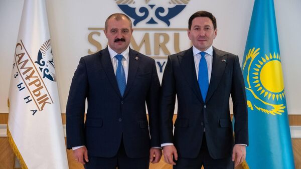 Президент Национального олимпийского комитета Беларуси Виктор Лукашенко и председатель правления АО Самрук-ҚазынаНурлан Жакупов
 - Sputnik Казахстан