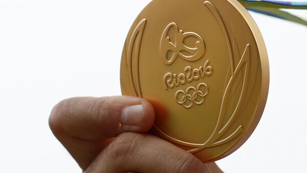 Золотая медаль Олимпиады-2016 в Рио-де-Жанейро - Sputnik Казахстан