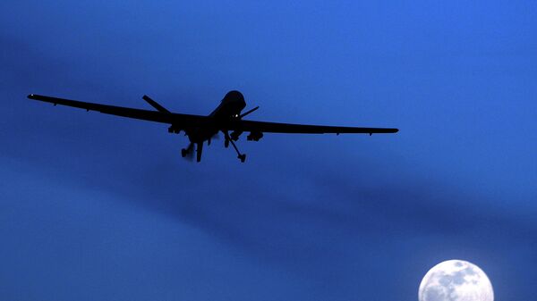 Беспилотный американский дрон летает над аэродром Кандагар, Южный Афганистан - Sputnik Казахстан