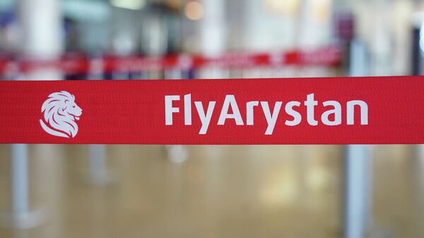 Лента заграждения авиакомпании Fly Arystan. Международный аэропорт Нурсултан Назарбаев в Нур-Султане - Sputnik Казахстан