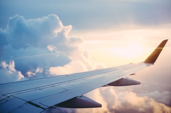 Вид из окна самолета, крыло самолета. Архивное фото - Sputnik Казахстан