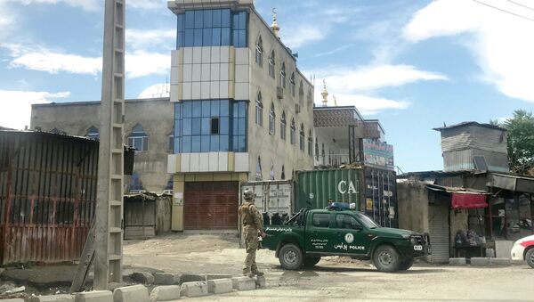 Афганские силы безопасности следят за мечетью после взрыва в Кабуле, Афганистан, 24 мая 2019 года - Sputnik Қазақстан
