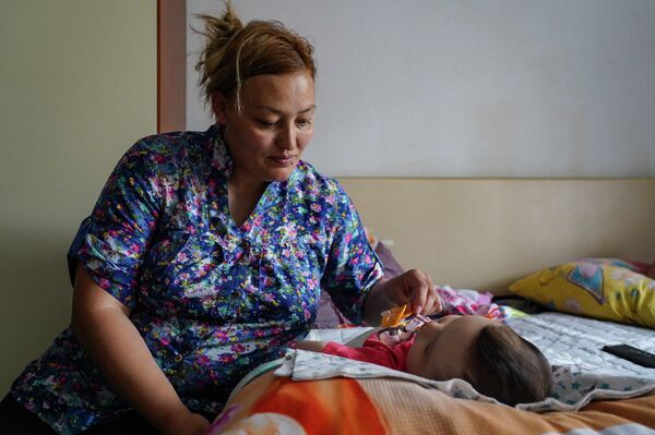 Мы впервые записали детей в кружки: семья получила обновленную социальную помощь - Sputnik Казахстан