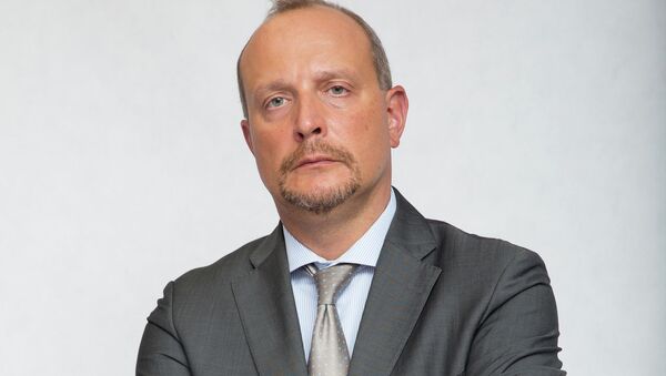 Директор Департамента торговой политики ЕЭК Антон Кудасов - Sputnik Казахстан