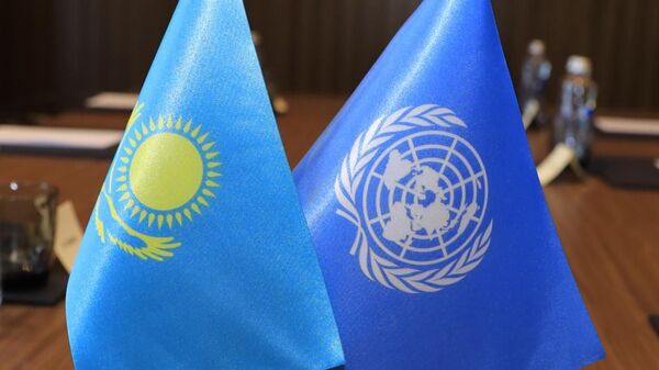 Флаги Казахстана и ООН - Sputnik Казахстан