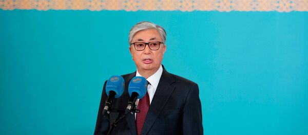 Касым-Жомарт Токаев на избирательном участке в день внеочередных выборов в Республике Казахстан - Sputnik Казахстан