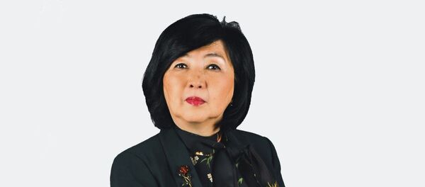 Директор департамента трудовой миграции и социальной защиты Евразийской экономической комиссии Паиза Суюмбаева - Sputnik Казахстан