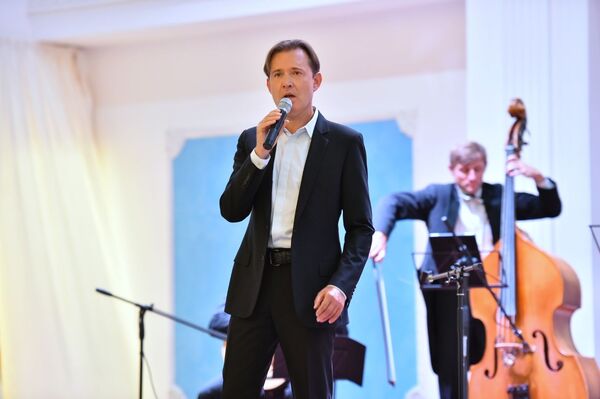 Как прошел концерт серебряного голоса России Олега Погудина в Нур-Султане Как прошел концерт серебряного голоса России Олега Погудина в Нур-Султане - Sputnik Казахстан