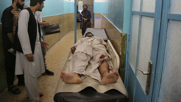Раненый в больнице после взрыва в зале бракосочетаний в Кабуле, Афганистан, в воскресенье, 18 августа 2019 года - Sputnik Казахстан