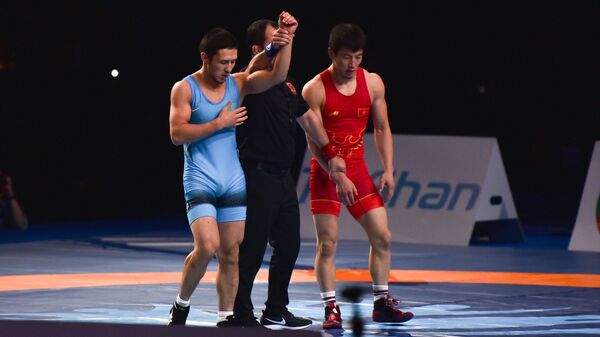 За бронзу в весовой категории до 63 килограммов казахстанец Алмат Кебиспаев вышел против кыргызстанца Тунара Шаршенбекова - Sputnik Қазақстан