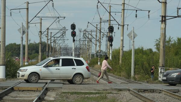Фото с места ЧП на перегоне Алматы - Шамалган , где автобус столкнулся с поездом - Sputnik Казахстан
