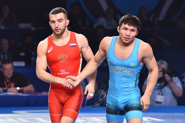 Серебро и отобранные баллы: итоги предпоследнего дня ЧМ по борьбе в Нур-Султане - Sputnik Казахстан