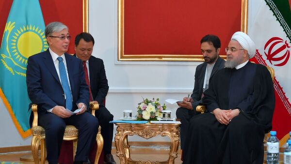 Касым-Жомарт Токаев и президент Исламской Республики Иран Хасан Рухани - Sputnik Казахстан