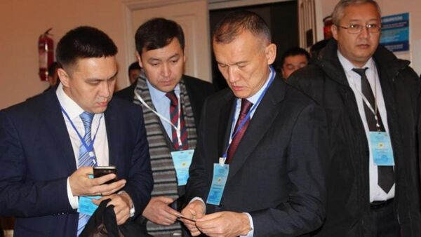 Казахстанская делегация во главе с главой Центризбиркома РК Бериком Имашевым - Sputnik Казахстан