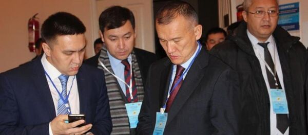 Казахстанская делегация во главе с главой Центризбиркома РК Бериком Имашевым - Sputnik Казахстан