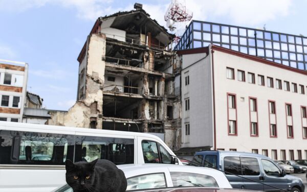  Здание старого телецентра, разрушенного крылатыми ракетами Томагавк во время операции НАТО против Югославии. - Sputnik Казахстан