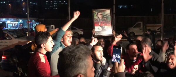 Ситуация в Алеппо: освобожденные кварталы с высоты птичьего полета и ликование жителей Ситуация в Алеппо: освобожденные кварталы с высоты птичьего полета и ликование жителей - Sputnik Казахстан