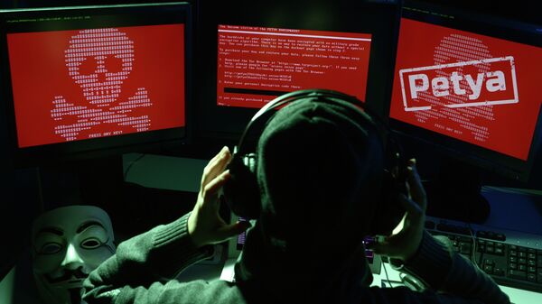 Атака вируса-вымогателя на компьютерах, архивное фото - Sputnik Казахстан