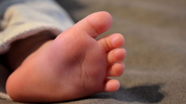 Ножка младенца, иллюстративное фото - Sputnik Қазақстан