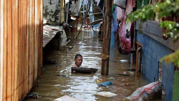 Последствия наводнения в Индонезии - Sputnik Казахстан