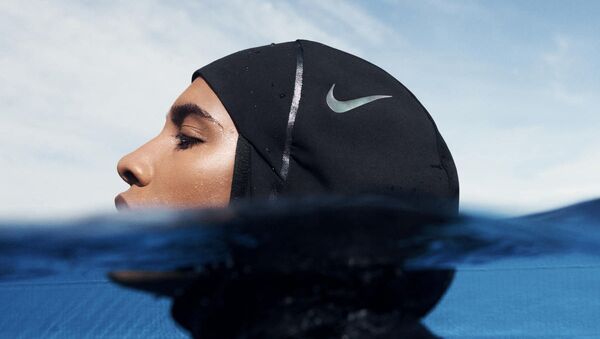 Компания Nike выпустила обновленную версию спортивного хиджаба Pro Hijab, ориентированную на спортсменов из стран Ислама - Sputnik Казахстан
