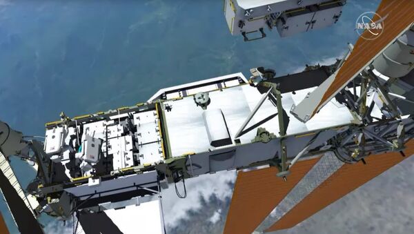 Выход в открытый космос на МКС для замены батареи - видео - Sputnik Казахстан